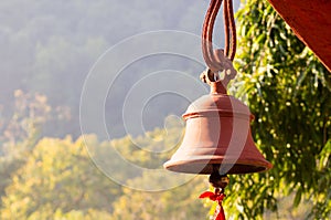 Hindu prayer bells in remote temple in forest