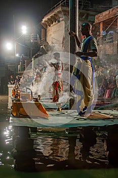 Hindu priest performs the Ganga Aarti ritual in Varanasi