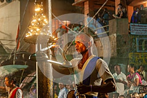 Hindu priest performs the Ganga Aarti ritual in Varanasi