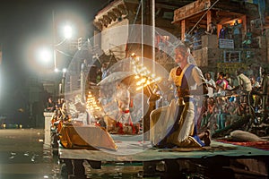 Hindu priest performs the Ganga Aarti ritual in Varanasi