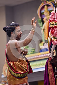 Hindu priest performs the pooja