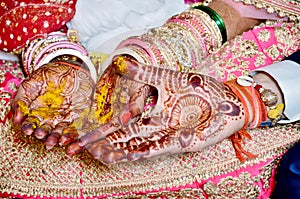 Hindu Rituals haldi on bride`s hands