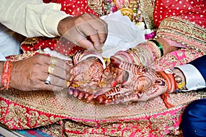 Hindu Rituals haldi on bride`s hands