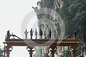 Hindu`s divine statue in top of the gate of Batu Caves near Kuala Lumpur, Malaysia.