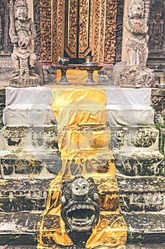 Hindu stone statue in the balinese temple. Tropical island of Bali, Indonesia.