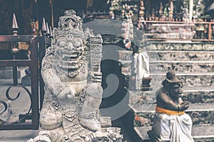 Hindu stone statue in the balinese temple. Tropical island of Bali, Indonesia.