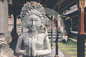 Hindu stone statue in the balinese temple. Tropical island of Bali, Indonesia.