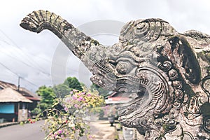 Hindu stone statue in the balinese temple. Tropical island of Bali, Indonesia.