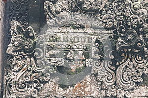 Hindu stone statue in the balinese temple. Tropical island of Bali, Indonesia.