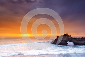 Hindu temple Pura Tanah Lot and sunset Bali, Indonesia.