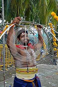 Hindu Thaipusam festival: pierced devotee in Singapore