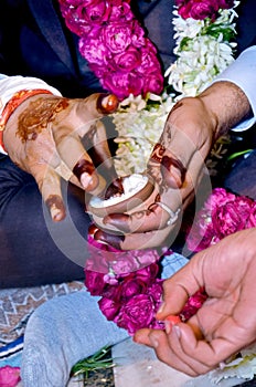 Hindu wedding ceremony. Details of traditional indian wedding. Beautifully decorated hindu wedding accessories. Indian marriage