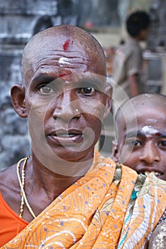 Hindu woman with shaven head