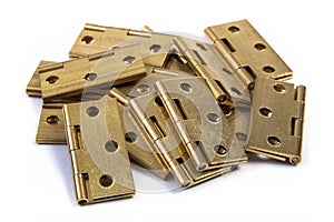 Hinges for doors. Golden brass. On white