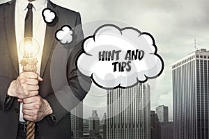 Hint and tips text on speech bubble with businessman