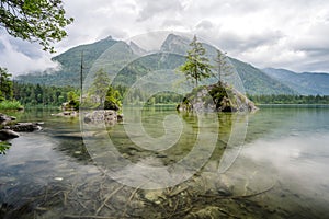 Hintersee Lake with reflection of Watzmann mountain peaks. Ramsau Berchtesgaden Bavaria, Germany, Europe