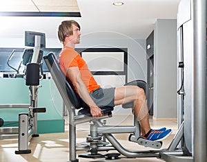 Hip abduction blond man exercise at gym closing