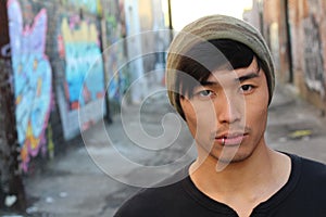 Hip Asian man wearing a beanie