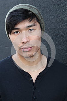 Hip Asian man wearing a beanie