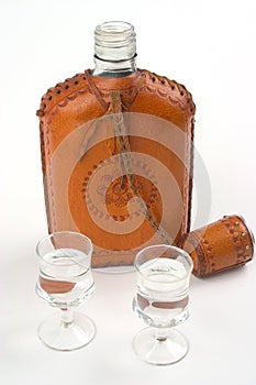 Hip flask and two glasses