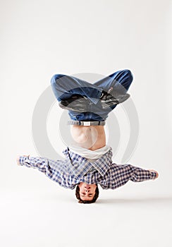 Hip-hop dancer balancing on his head