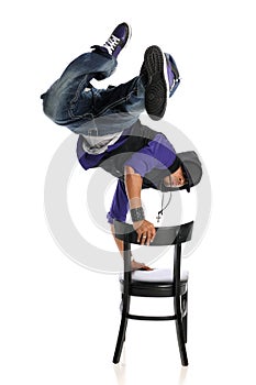 Hip Hop Style Dancer performing usind a chair