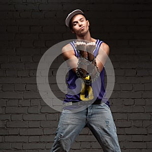 Hip-hop style man holding chain