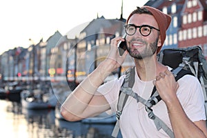 Hip tourist calling from Nyhavn, Copenhagen Denmark
