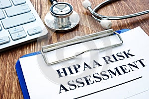 Hipaa risk assessment form and stethoscope