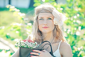 Hippie girl with summer flowers