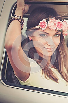 Hippie girl in a van