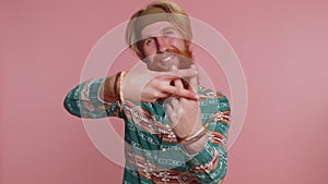 Hippie man show hashtag symbol with hands, likes tagged message popular viral internet content sign