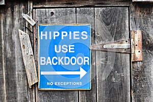 Hippies Use Backdoor Sign