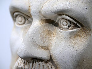 Hippocratic bust portrait, sculpture face close up photo
