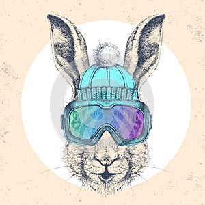 Hipster animal rabbit in winter hat and snowboard goggles. Hand drawing Muzzle of hare