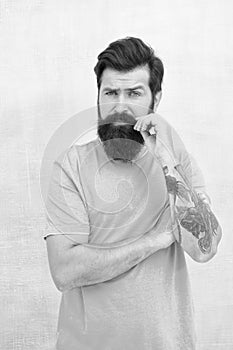 Hipster barber. Barbershop salon. Barber and hairdresser services. Bearded man with stylish mustache. Barber concept