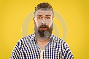 Hipster with beard and mustache emotional surprised expression. Rustic surprised macho. Surprising news. Man bearded