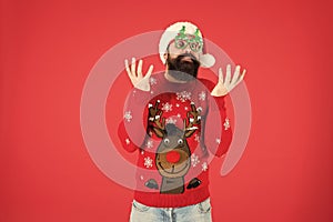 Hipster bearded man wear winter sweater and hat. New year. Knitted sweater. Happy new year. Christmas spirit. Funny