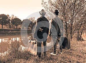 Hipster best friends are ready for adventure - Travel and fashion vintage concept - Black and white editing - Warm soft brown