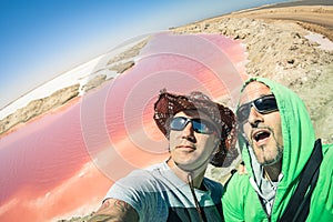 Hipster best friends at Walvis Bay pink salines in Namibia