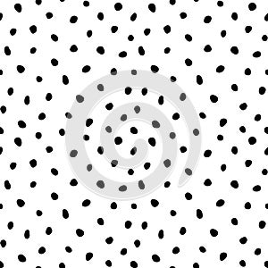 Hipster black and white seamless polka dot pattern. Vector irregular abstract texture with random hand drawn spots