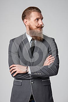 Hipster business man looking to side