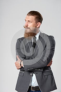 Hipster business man looking to side