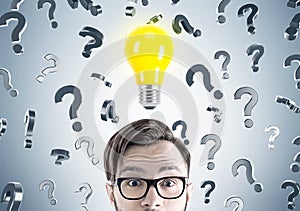 Hipster businessman, questions and light bulb