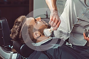 Hipster client visiting barber shop