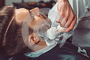 Hipster client visiting barber shop