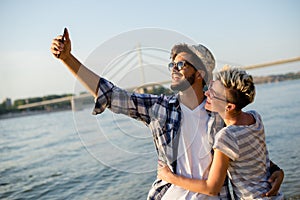 Hipster couple taking selfie