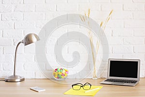 Hipster desktop on brick background