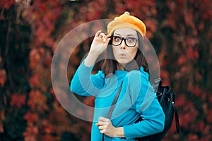 Funny Woman with Eyeglasses and Pumpkin Beret Enjoying Autumn