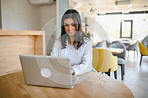 Hipster Girl use Laptop huge Loft Studio.Student Researching Process Work.Young Business Woman Working Creative Startup